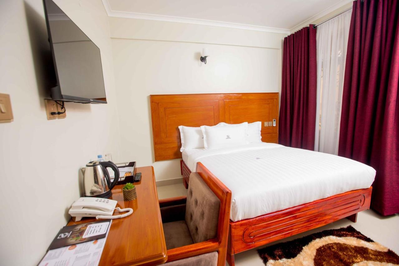 Hadjens Hotel Mwanza Bagian luar foto